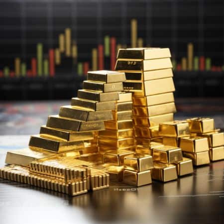 a stack of gold with an investing graph in the background
